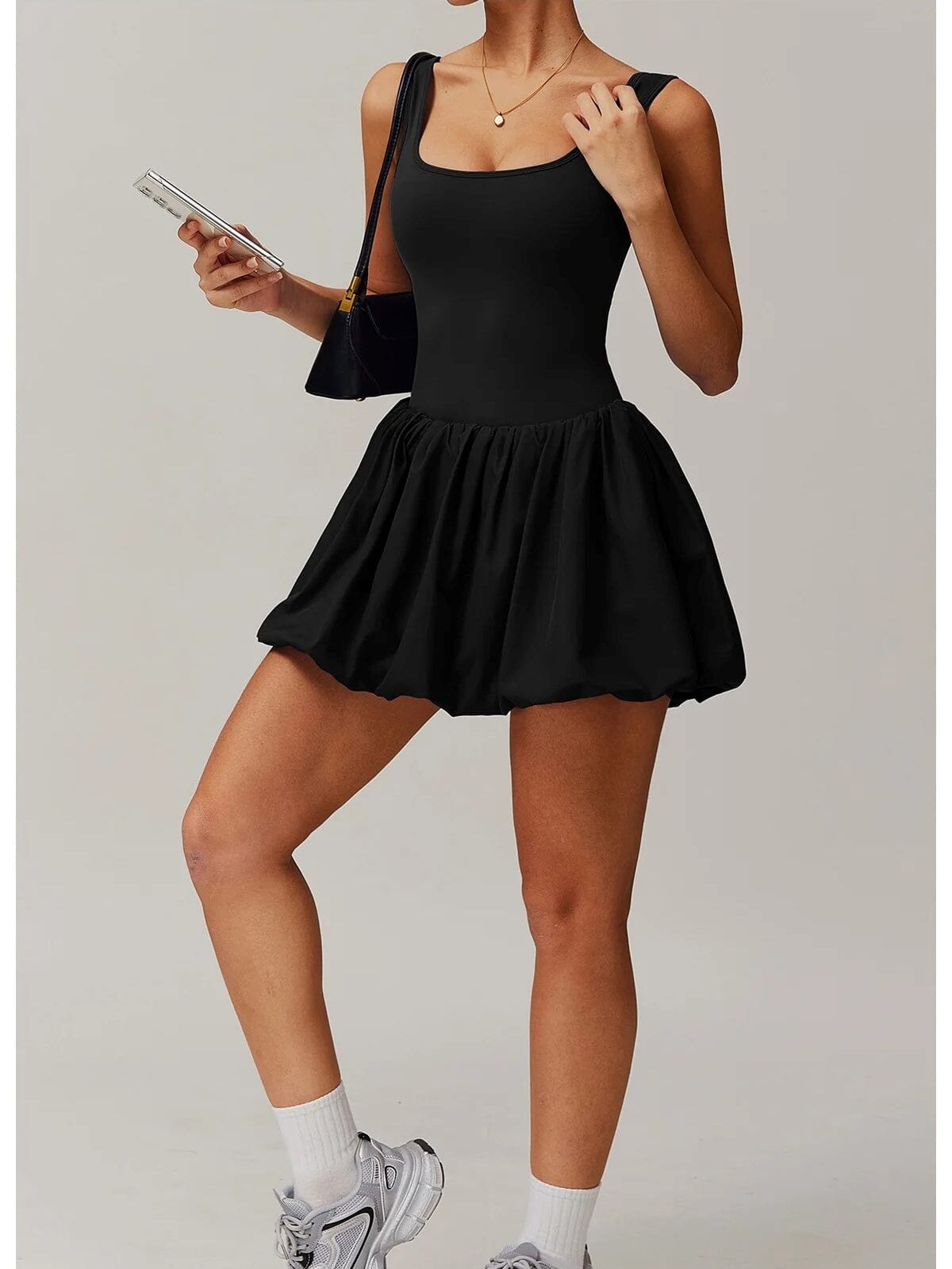 Combinaison Sport Femme Noire 2-en-1 : Élégance et Maintien pour Toutes Vos Activités